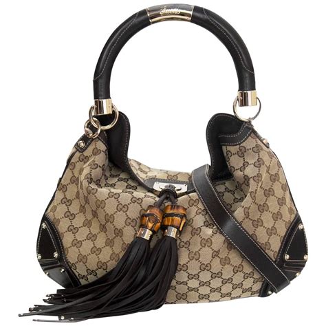 gucci bridle medium tote with tassles|Gucci tote bag.